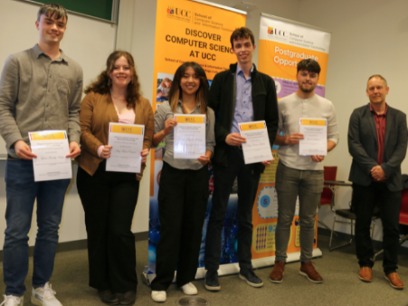 Image of CHOMG group receiving best software project